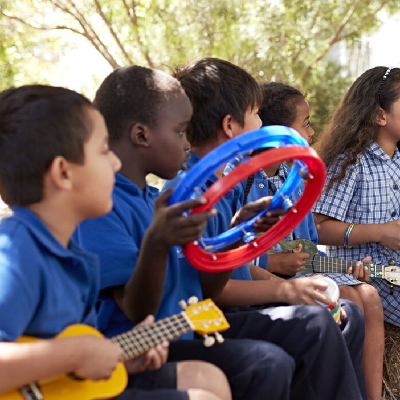 Students engaging in a music project